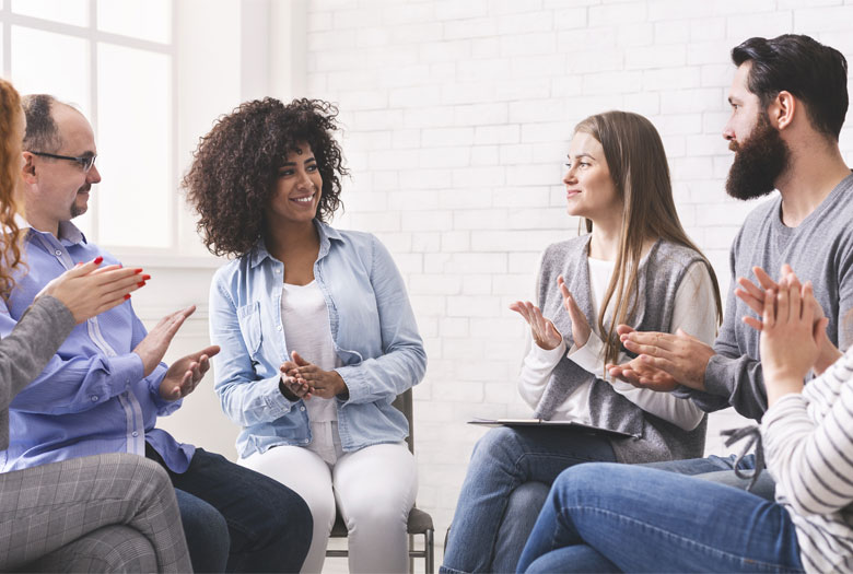 people in group therapy for addiction