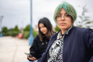 woman with blue hair considers addiction in lgbtq community