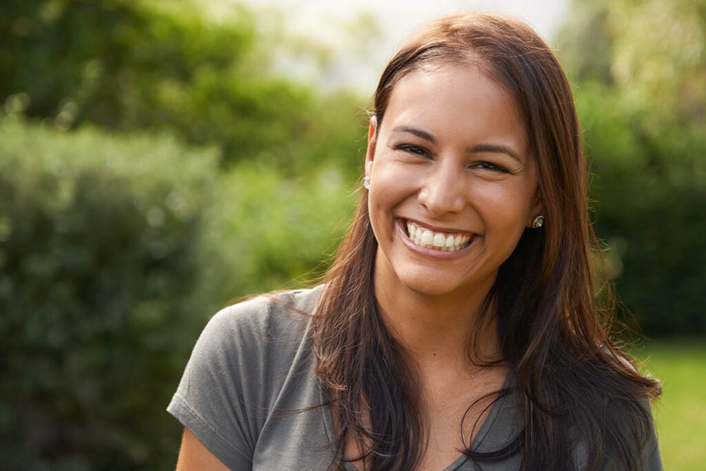 woman smiles while learning what to expect from emdr therapy