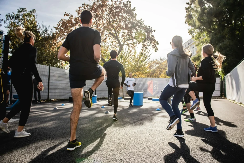 A group workout outside in Wilmington, NC during a Day Intensive Outpatient Program (IOP).